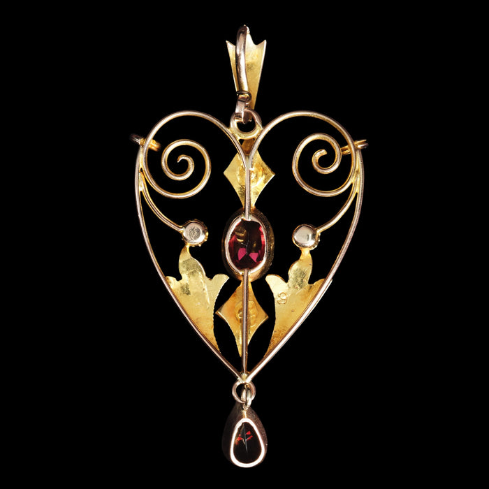 Reverse of British antique heart-shaped pendant stamped 9ct