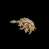 Three-quarter view of antique Victorian split pearl starburst pendant and brooch in 15ct gold, highlighting depth, pearl settings and celestial starburst form