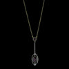 Antique Edwardian garnet and diamond pendant in 15ct yellow and white gold