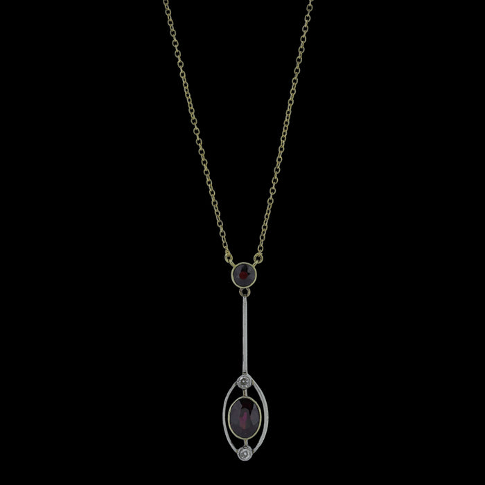 Antique Edwardian garnet and diamond pendant in 15ct yellow and white gold