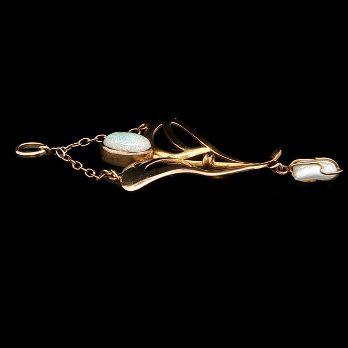 Art Nouveau 15ct gold lavalier pendant with central opal cabochon and pearl drop, antique floral design c1900 Side view