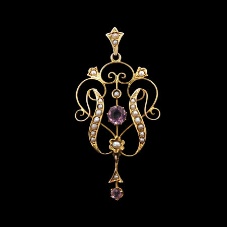 Edwardian 9ct gold amethyst and seed pearl pendant with openwork Art Nouveau design and drop detail, circa 1905 front
