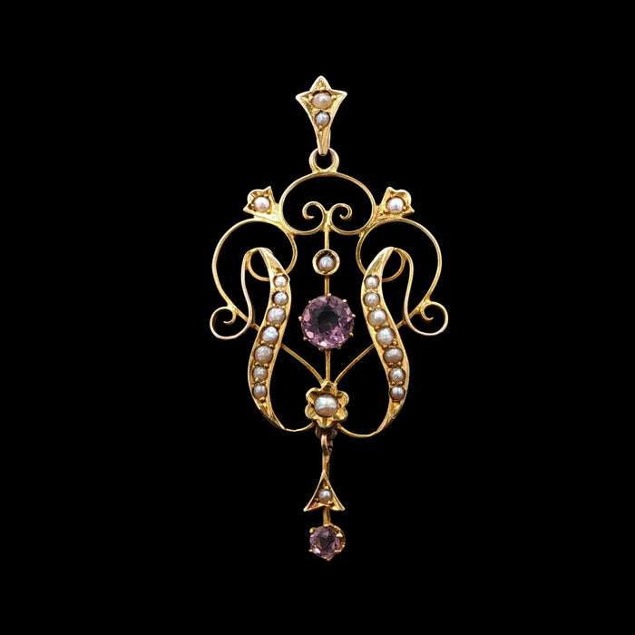 Edwardian 9ct gold amethyst and seed pearl pendant with openwork Art Nouveau design and drop detail, circa 1905 front