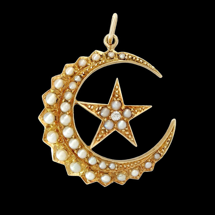 Victorian 18ct gold crescent moon and star pendant set with 33 split pearls and a central old-cut diamond, Saunders & Shepherd c1890 celestial jewellery front view
