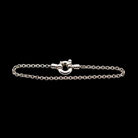 Vintage sterling silver belcher chain bracelet with bolt ring clasp, Edinburgh hallmark 1999, lion passant and maker’s mark LL visible, polished round links, classic minimalist British silver jewellery design.