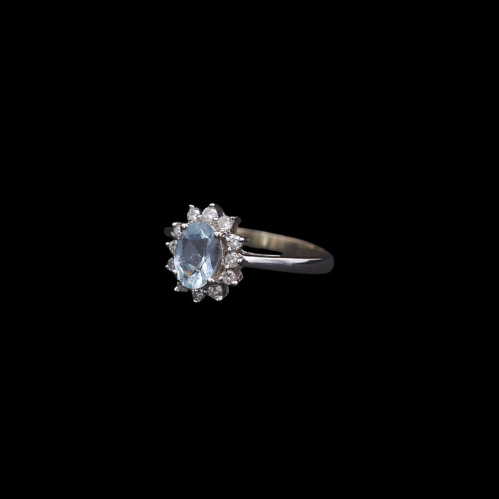Side profile of aquamarine and diamond white gold ring