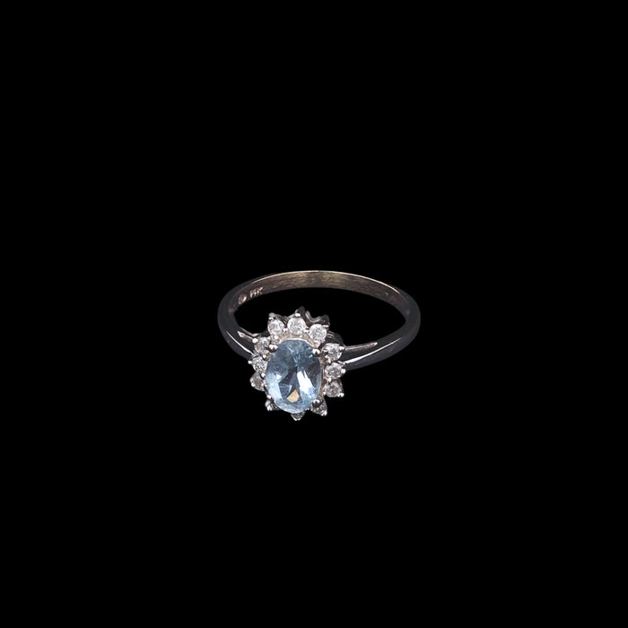 14ct white gold aquamarine and diamond cluster ring front with hallmark view